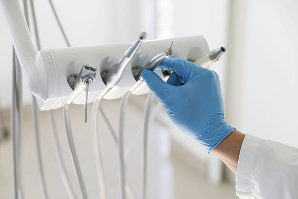 Professional Tooth Extraction technician working in Bret Harte, CA